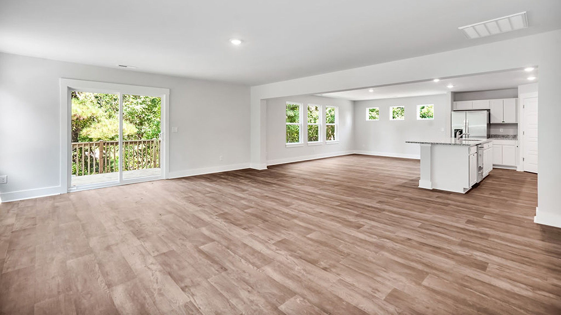 The living area is an open concept, where your kitchen, living, and dining areas blend seamlessly into a space perfect for everyday living and entertaining.