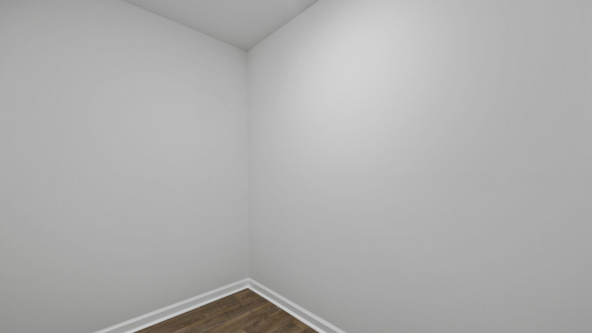 Two other bedrooms share a second bathroom. The laundry room is located at the front of home