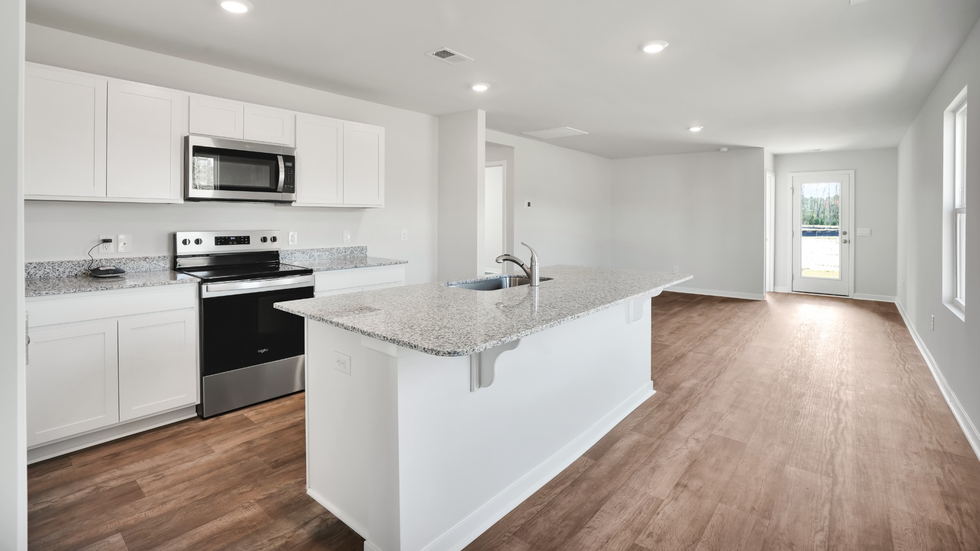 This appealing one-story layout optimizes living space with an open concept kitchen situated in between the living room and dining room and all bedrooms upstairs. The living room overlooks a covered patio perfect for relaxing and entertaining outdoors.