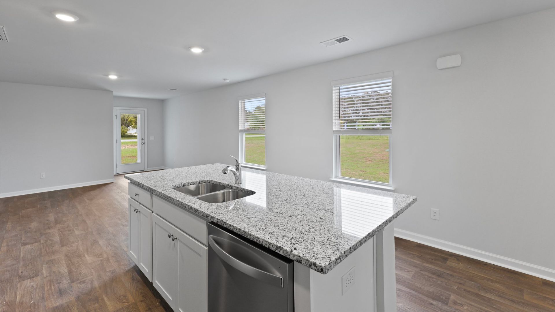 This appealing one-story layout optimizes living space with an open concept kitchen situated in between the living room and dining room and all bedrooms upstairs. The living room overlooks a covered patio perfect for relaxing and entertaining outdoors.