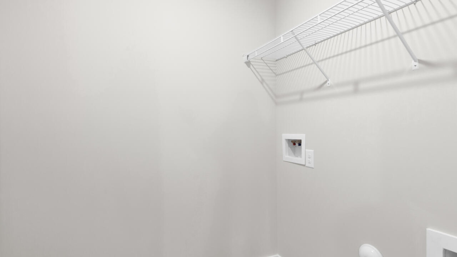 The primary suite is tucked away in the back of the home, offering a peaceful retreat complete with a walk-in shower (glass door included!), granite vanity, and a roomy walk-in closet.