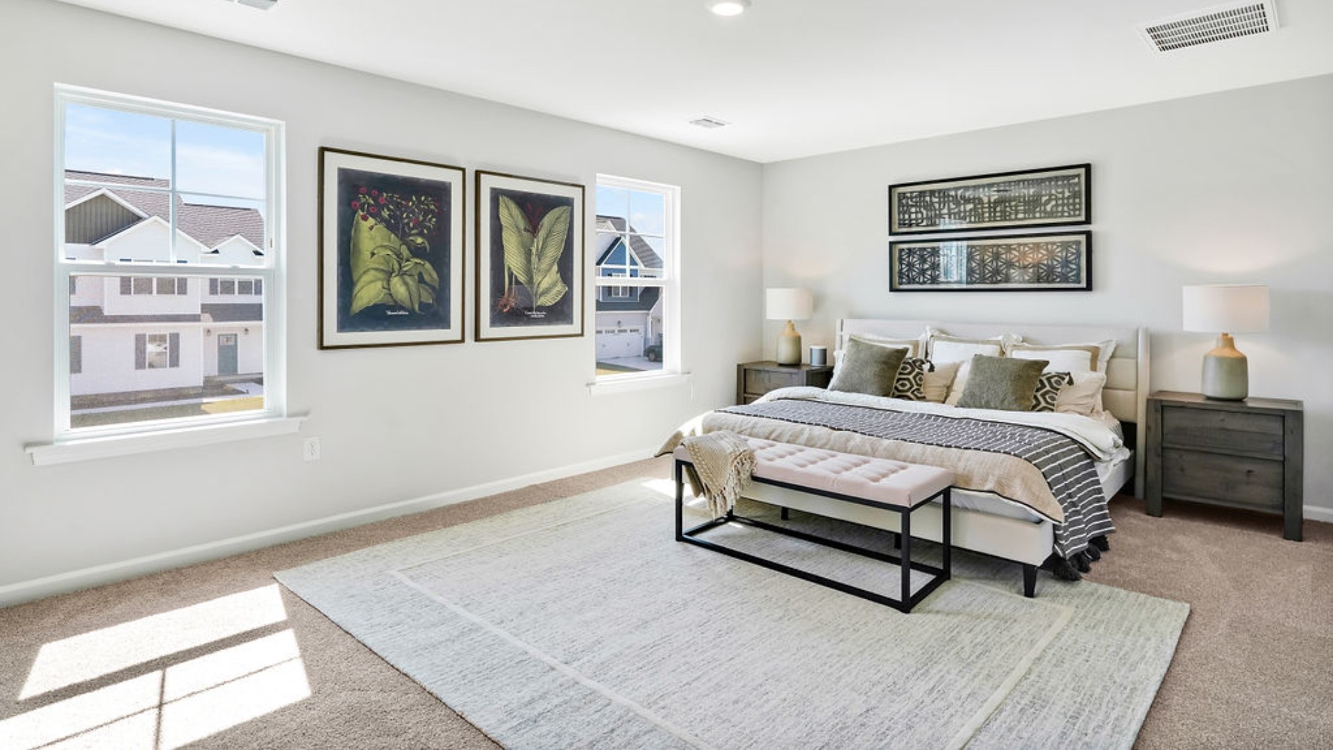 Upstairs, the Primary Suite offers a private bathroom, and the rest of the second floor includes three additional bedrooms and a convenient laundry room.