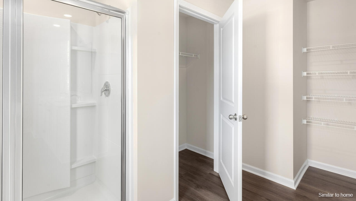 Designed for modern living, the main level features a flexible front room that can serve as a formal dining area, home office, or sitting room. The open-concept kitchen, dining and family room flow seamlessly together, perfect for entertaining and everyday living.