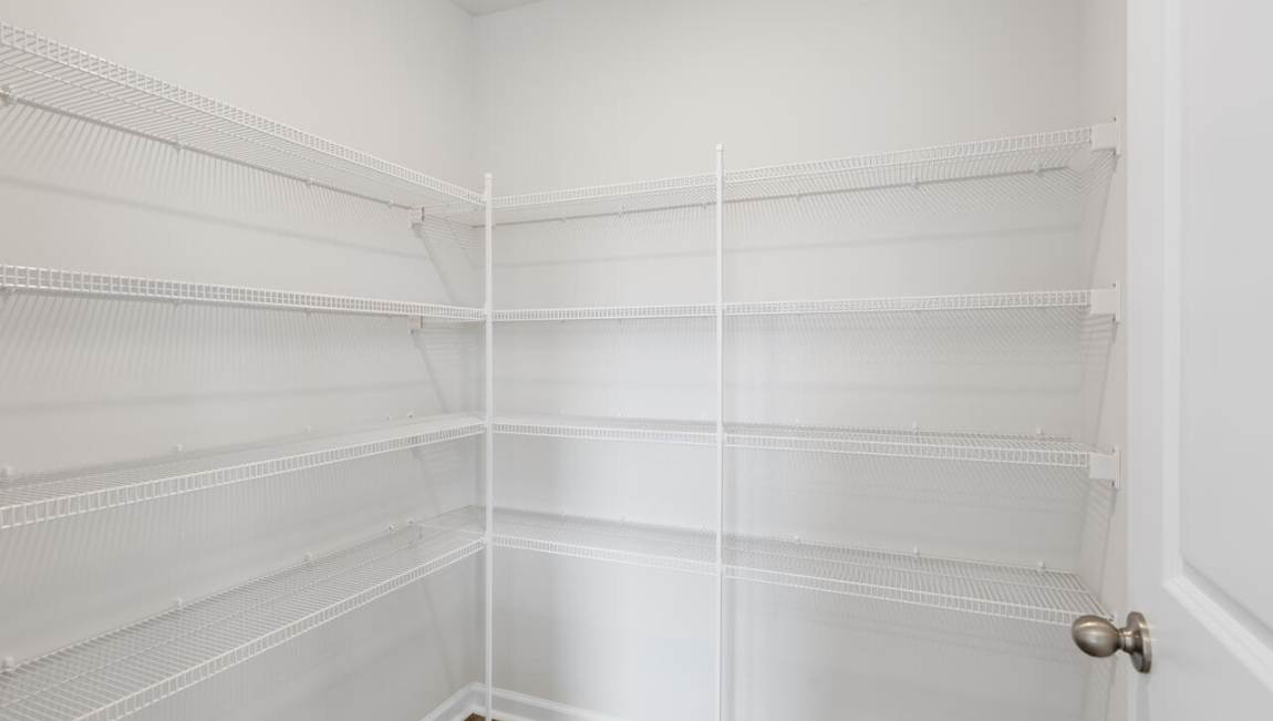 The open-concept kitchen, dining and family room flow seamlessly together, perfect for entertaining and everyday living.