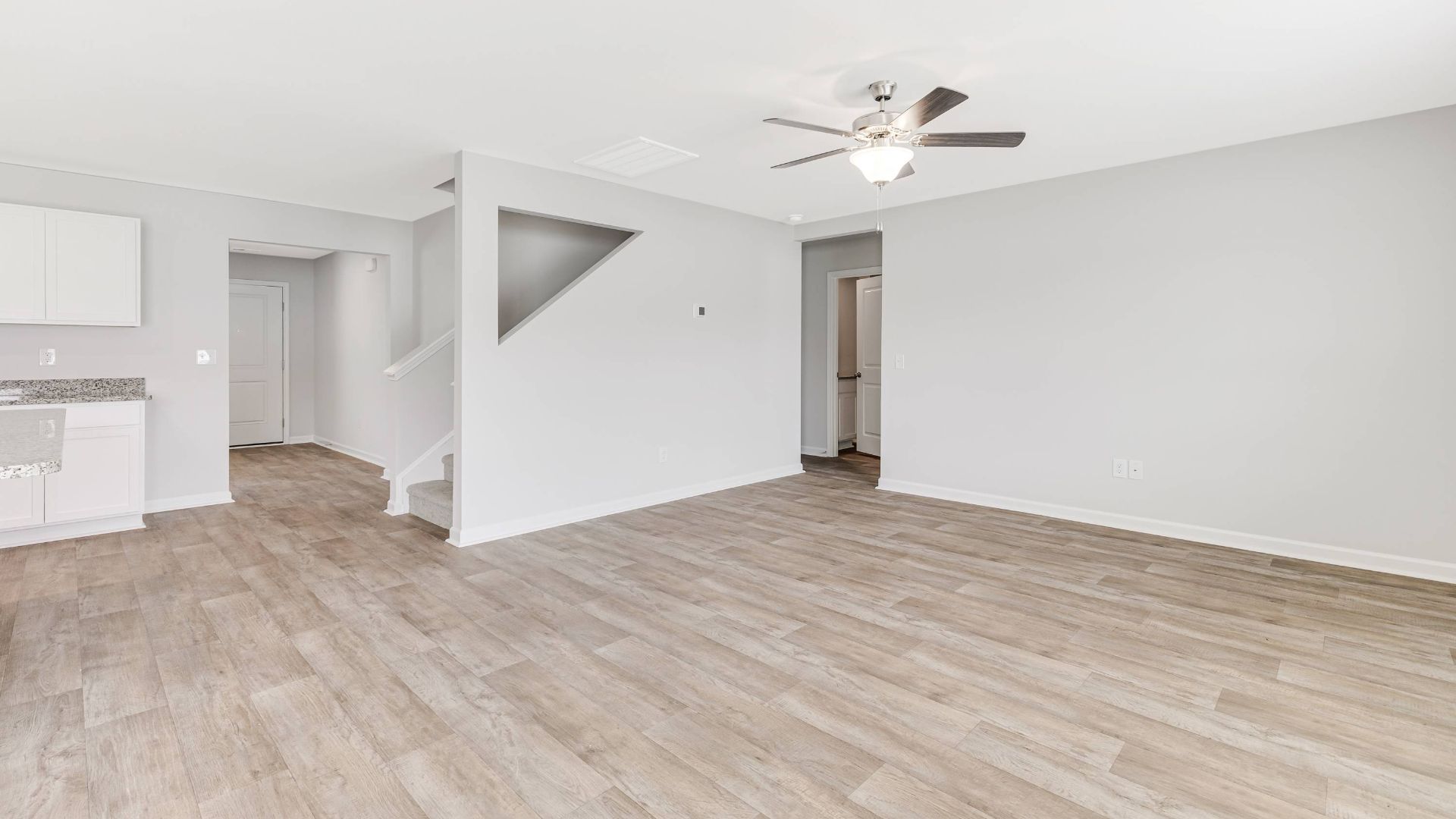 The living area is an open concept, where your kitchen, living, and dining areas blend seamlessly into a space perfect for everyday living and entertaining.