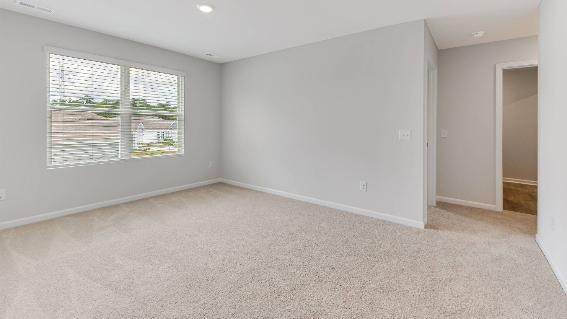 The primary bedroom has its own attached bathroom that features a walk-in closet and all the space you need to get ready in the morning. Sharing a sink isn’t a worry with the double vanity, and you also get additional privacy with a separate door for the toilet and shower.