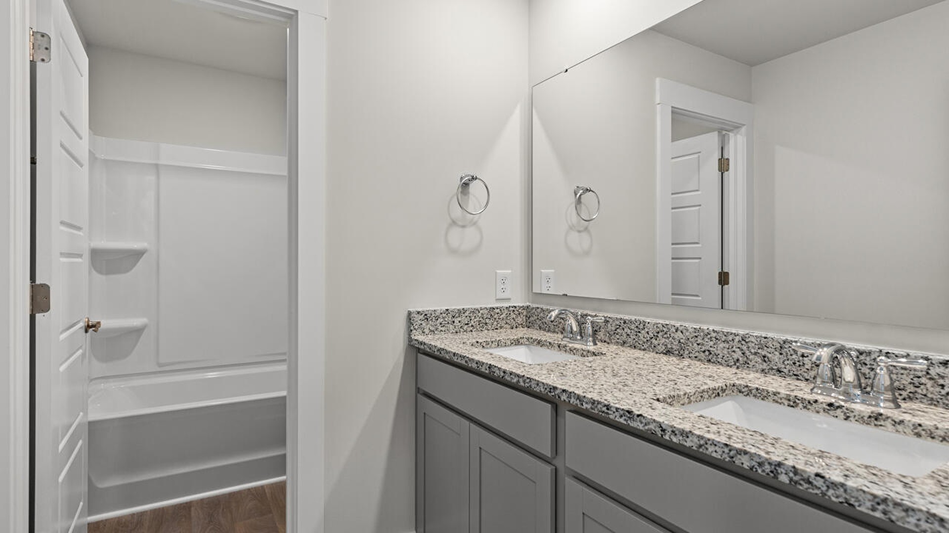 The primary bedroom is on the first floor and has its own attached bathroom that features a walk-in closet and all the space you need to get ready in the morning.