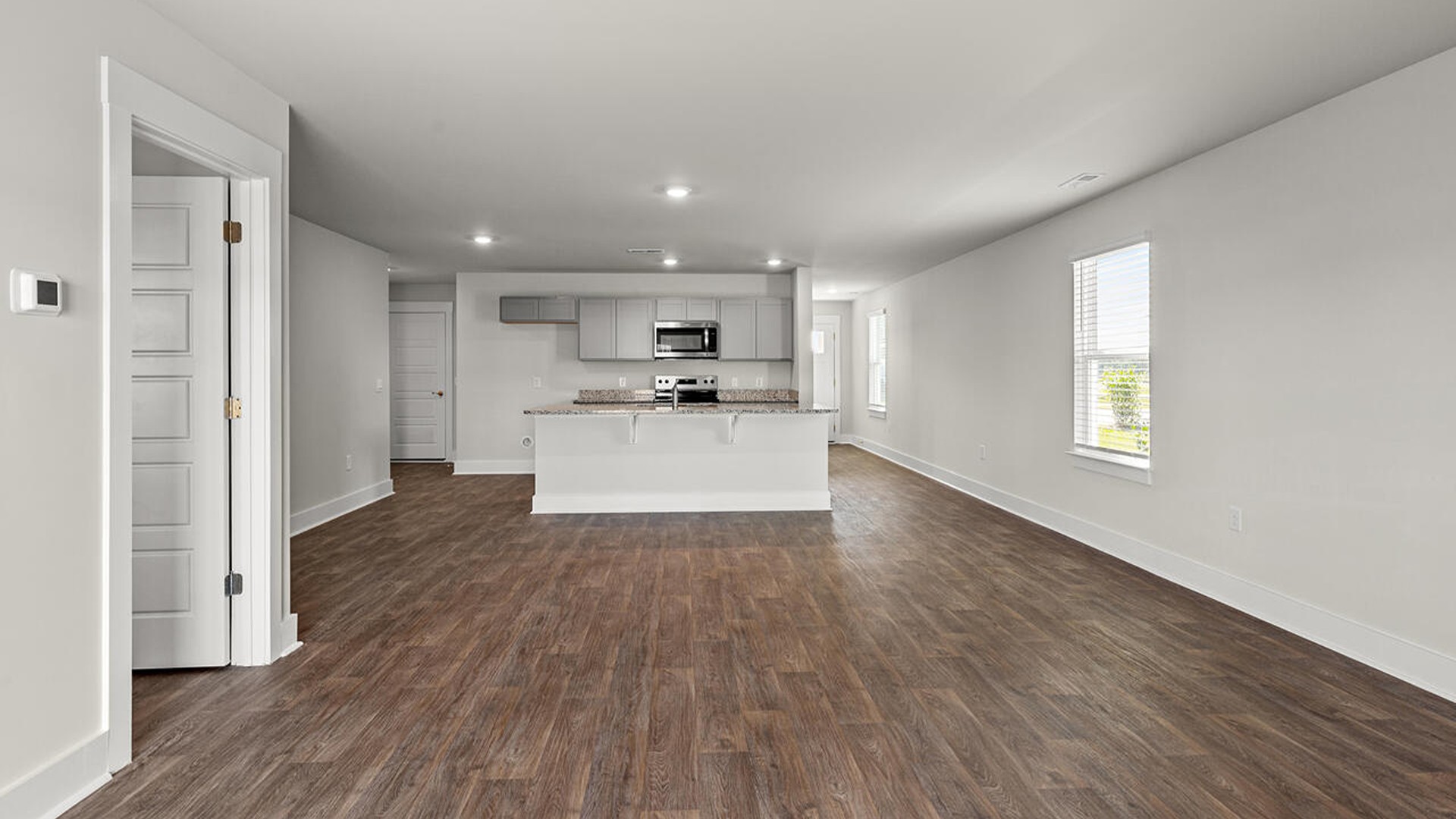 The living area is an open concept, where your kitchen, living, and dining areas blend seamlessly into a space perfect for everyday living and entertaining.