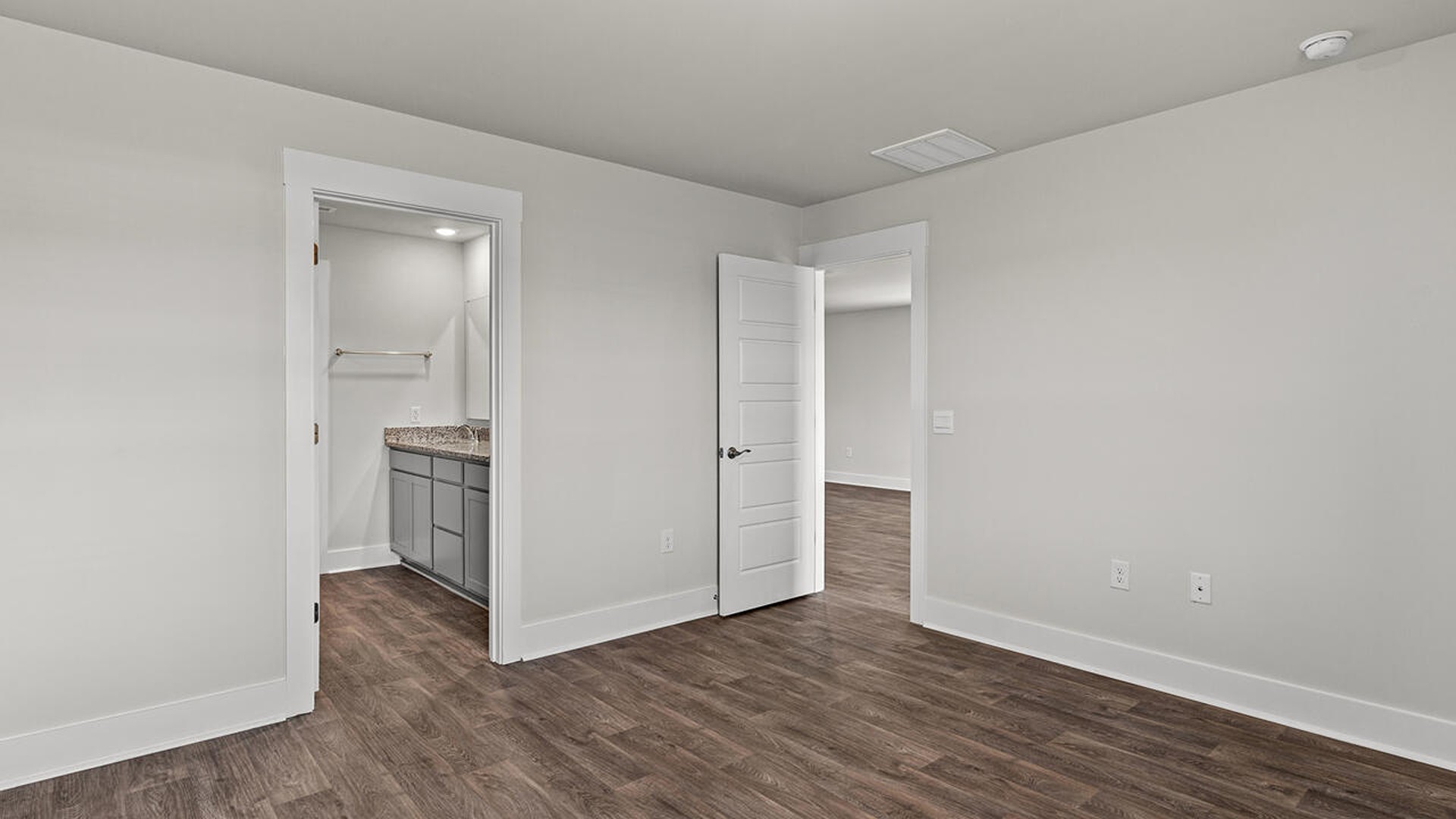 The primary bedroom is on the first floor and has its own attached bathroom that features a walk-in closet and all the space you need to get ready in the morning.