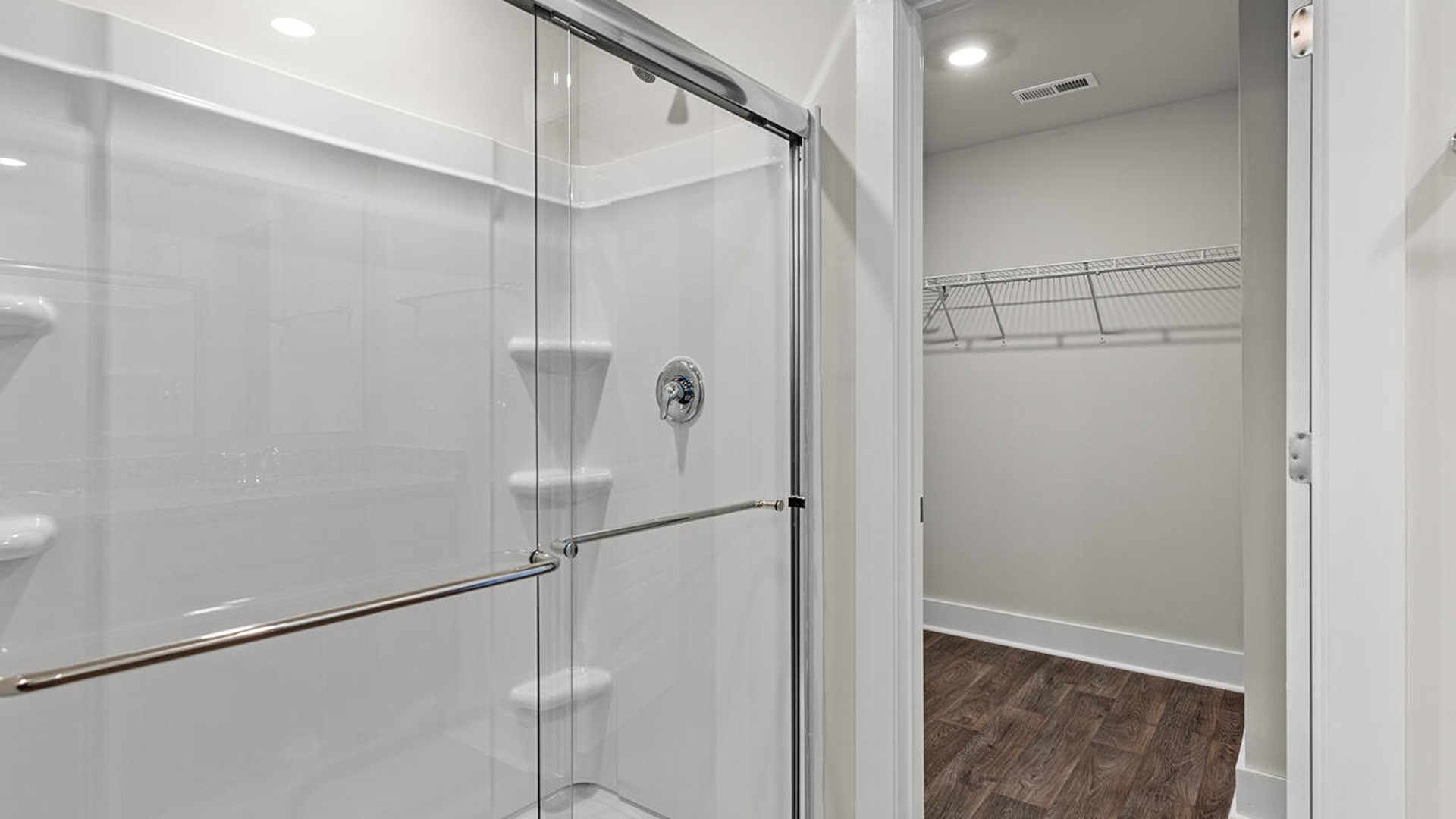 The primary bedroom is on the first floor and has its own attached bathroom that features a walk-in closet and all the space you need to get ready in the morning.