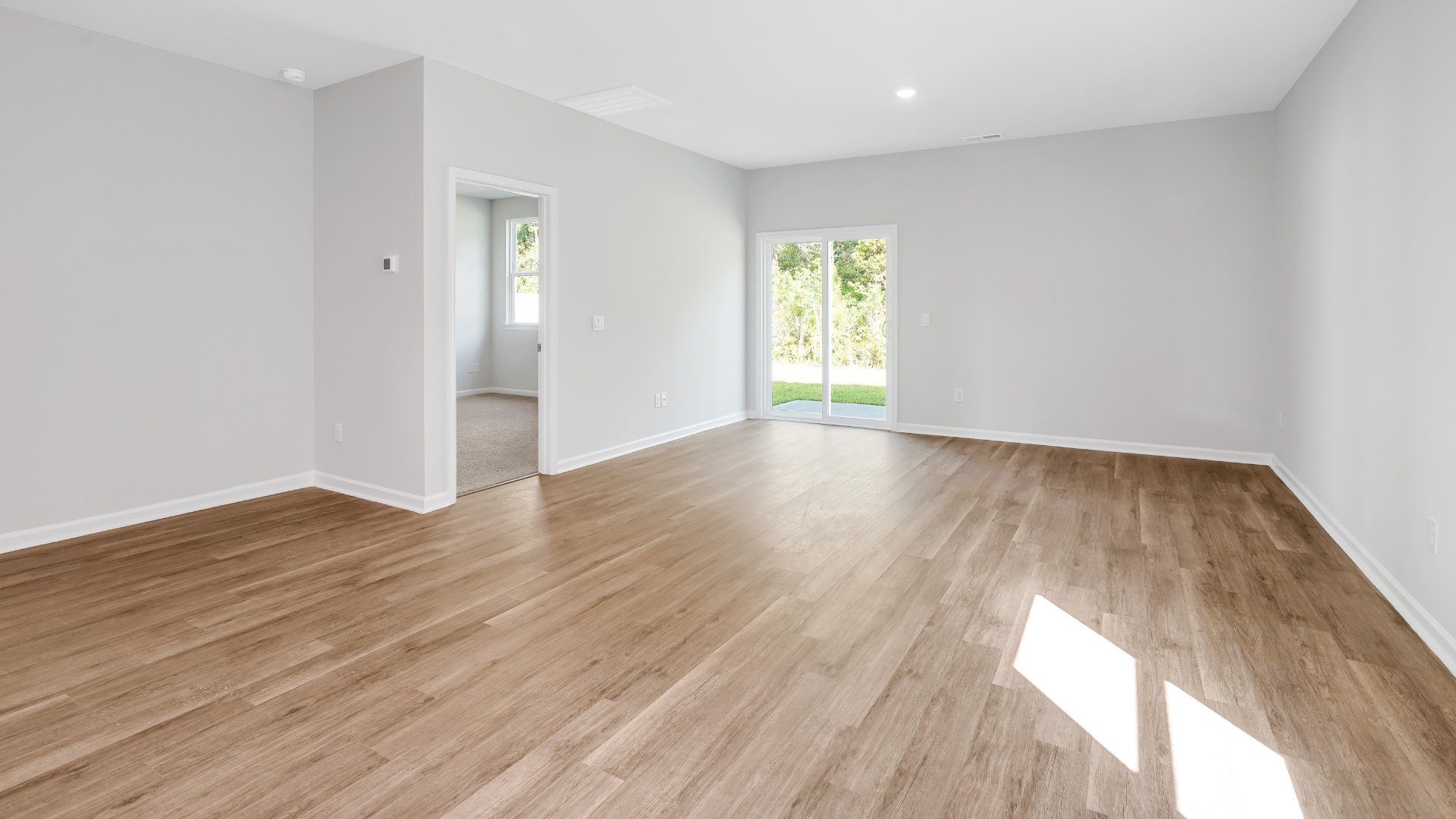 The kitchen features beautiful cabinets, granite countertops, and stainless-steel appliances, which are sure to both turn heads and make meal prep easy. You’ll never be too far from the action with the living and dining area right there.