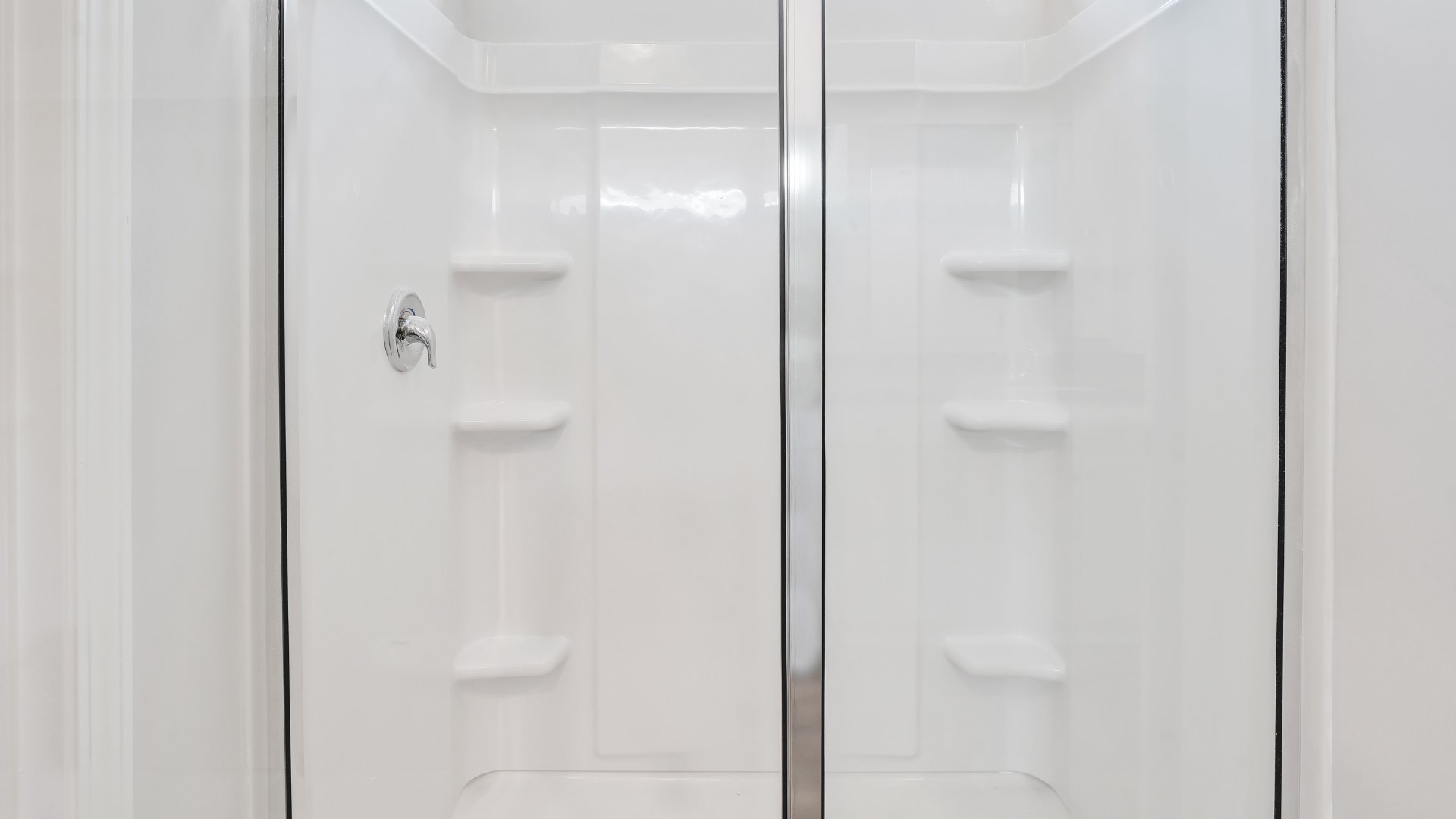 The primary bedroom is on the first floor and has its own attached bathroom that features a walk-in closet and all the space you need to get ready in the morning.