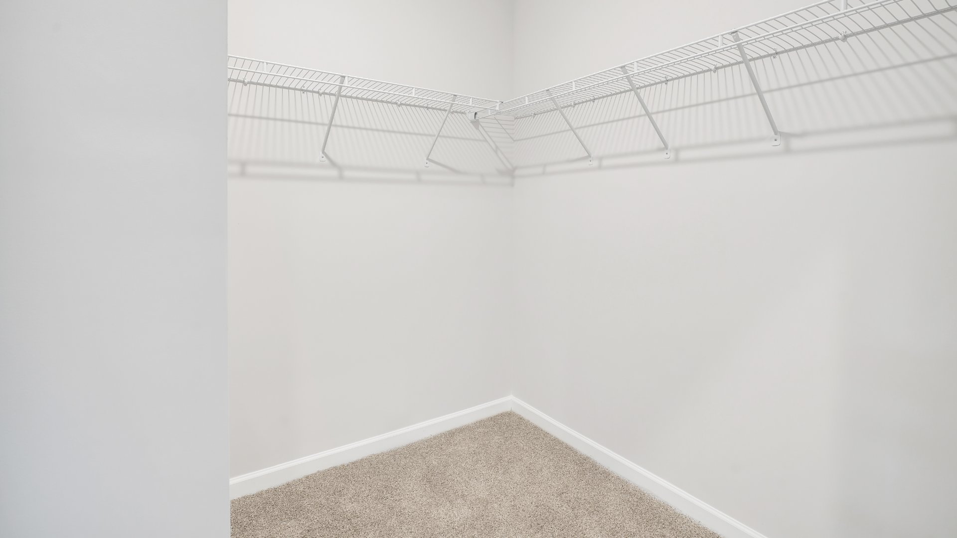 The primary bedroom is on the first floor and has its own attached bathroom that features a walk-in closet and all the space you need to get ready in the morning.