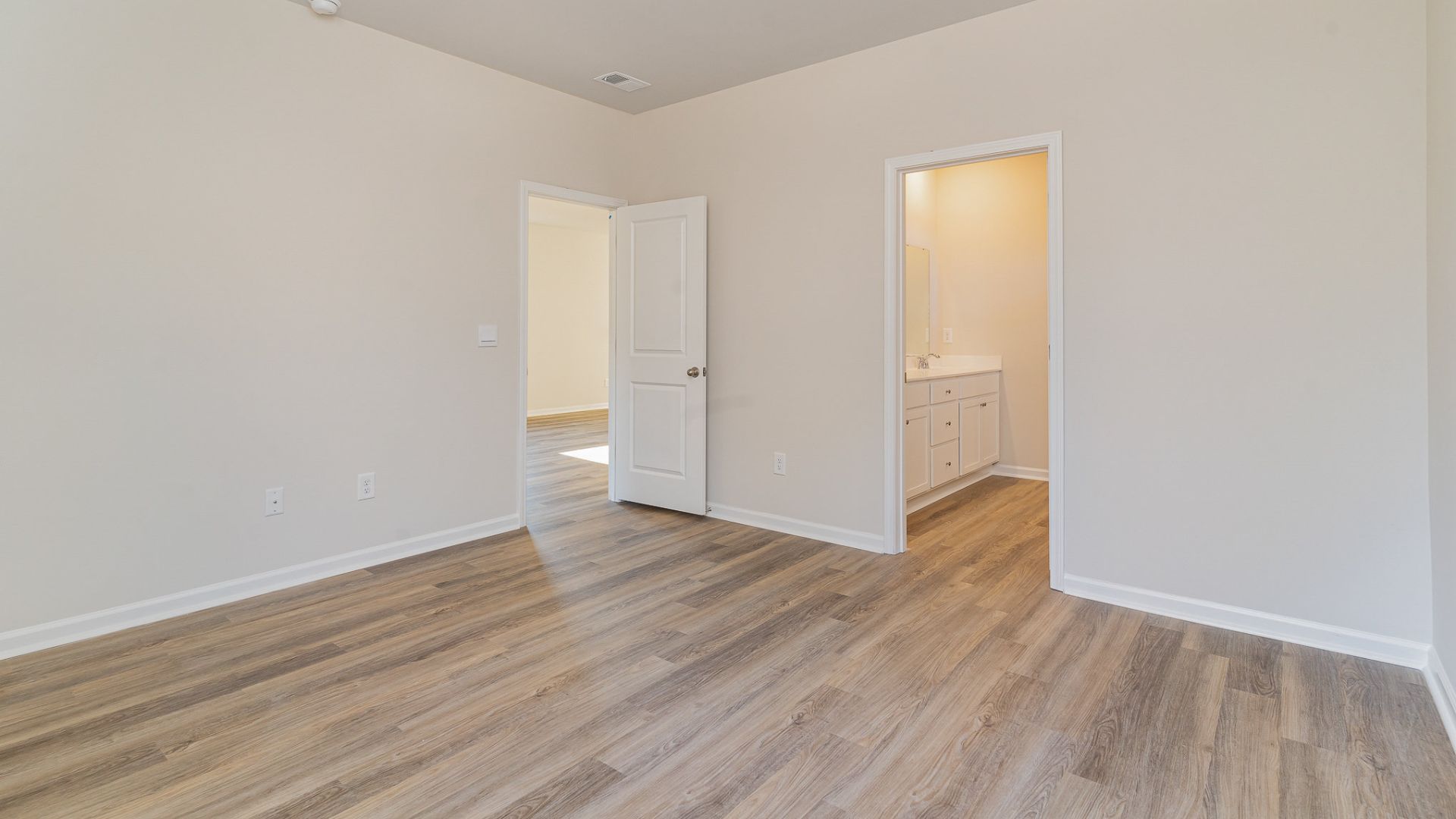 The primary bedroom has its own attached bathroom that features a walk-in closet and all the space you need to get ready in the morning. Sharing a sink isn’t a worry with the double vanity, and you also get additional privacy with a separate door for the toilet and shower.