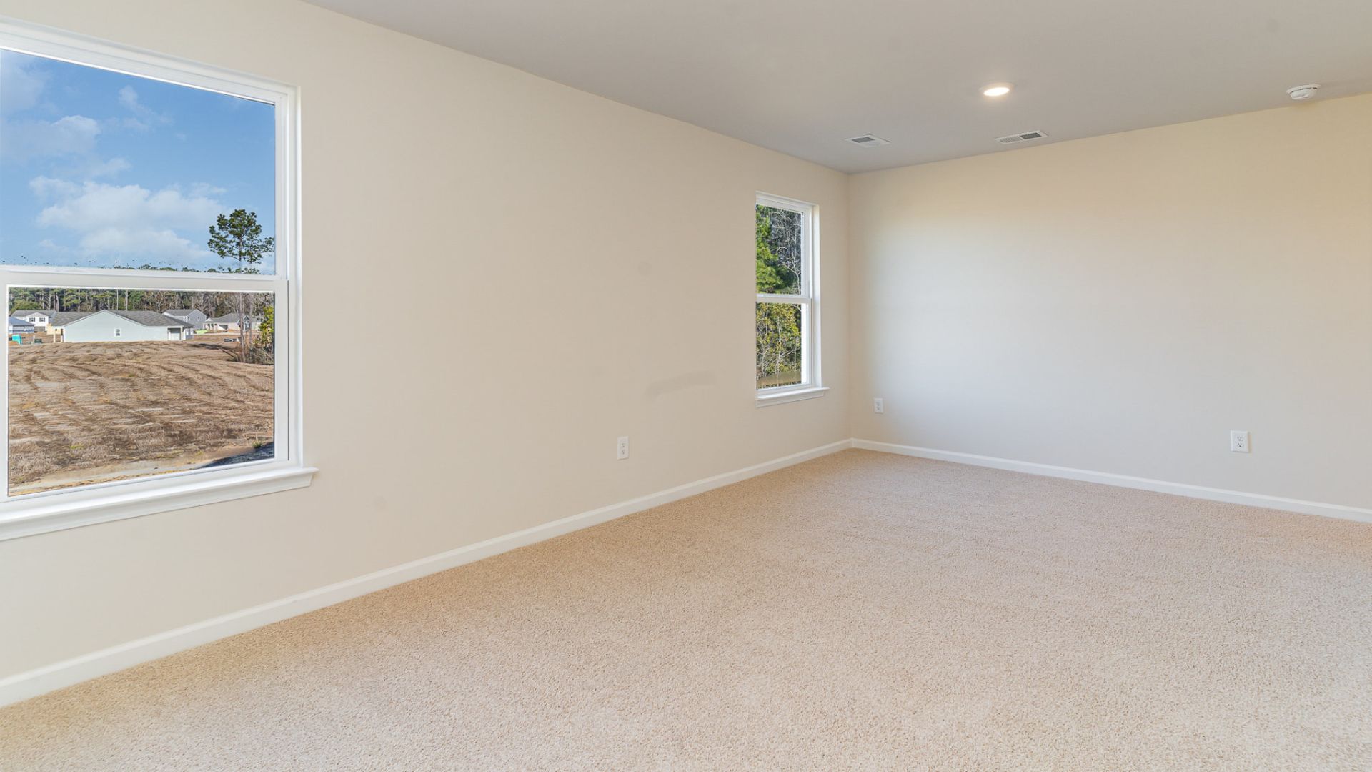 The primary bedroom has its own attached bathroom that features a walk-in closet and all the space you need to get ready in the morning. Sharing a sink isn’t a worry with the double vanity, and you also get additional privacy with a separate door for the toilet and shower.