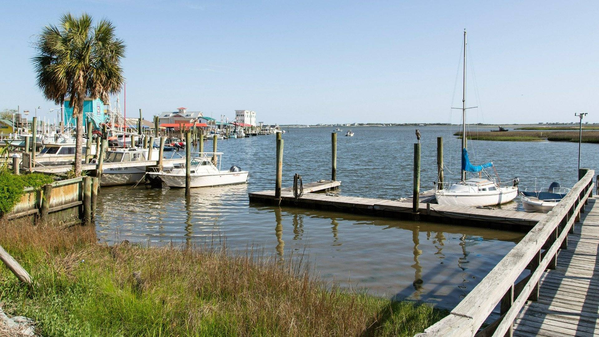 Situated in the heart of South Brunswick County, this rapidly expanding area lies just south of Wilmington, drawing people who appreciate a rural small-town vibe. Renowned for its stunning beaches, the region is a haven for water sports enthusiasts. Boaters can reach Sunset Harbor Boat Ramp in just 6 minutes. Golfers have access to numerous world-class courses and resorts. Beach lovers are in for a treat with quick drives to the finest beaches in Brunswick County like Oak Island, Holden Beach, and Ocean Isle in North Carolina