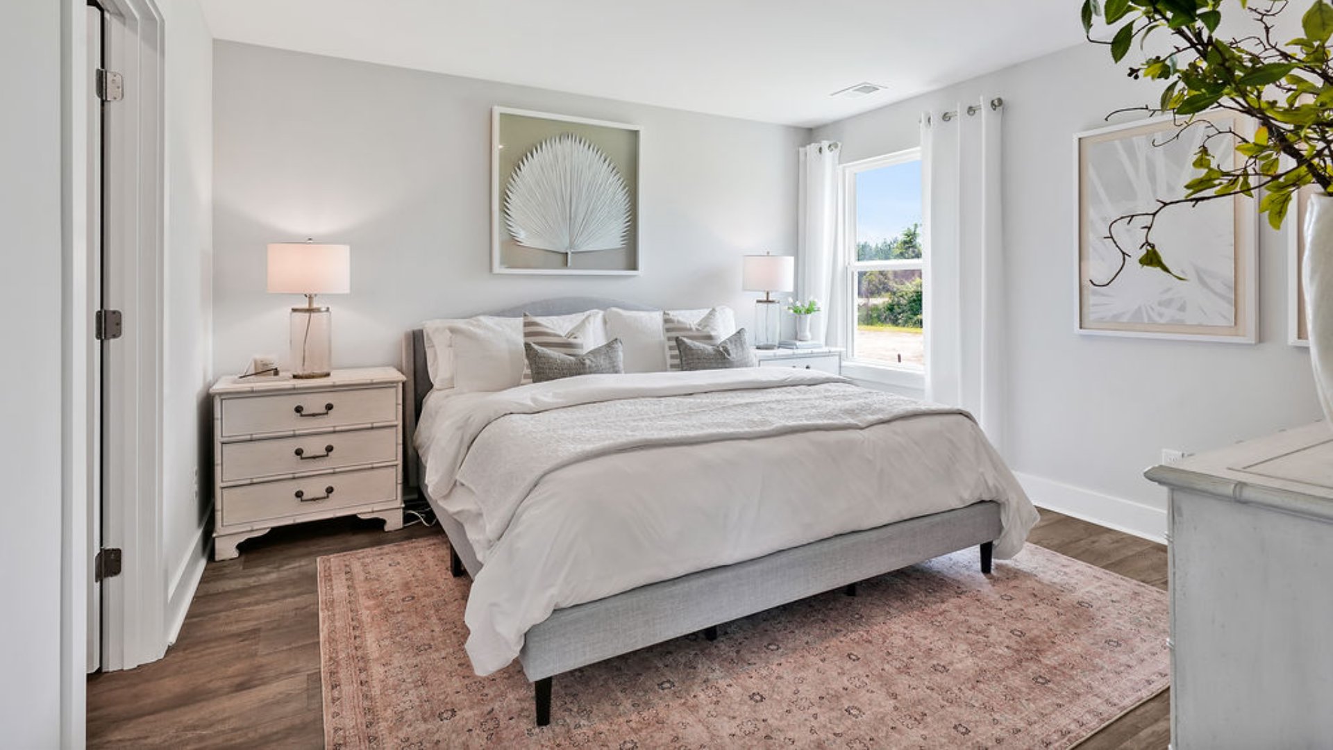The primary bedroom is on the first floor and has its own attached bathroom that features a walk-in closet and all the space you need to get ready in the morning. Sharing a sink isn’t a worry with the double vanity, and you also get additional privacy with a separate door for the toilet and shower.