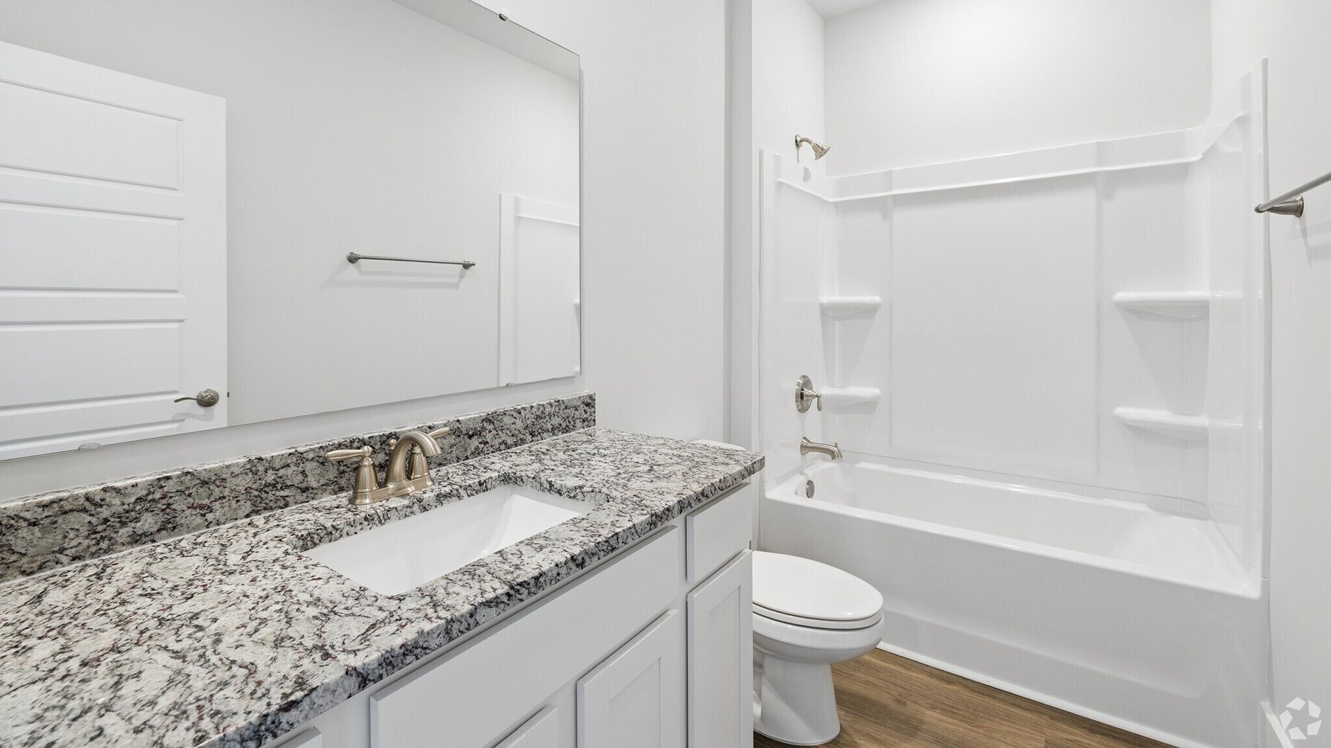 The primary bedroom has its own attached bathroom that features a walk-in closet and all the space you need to get ready in the morning.