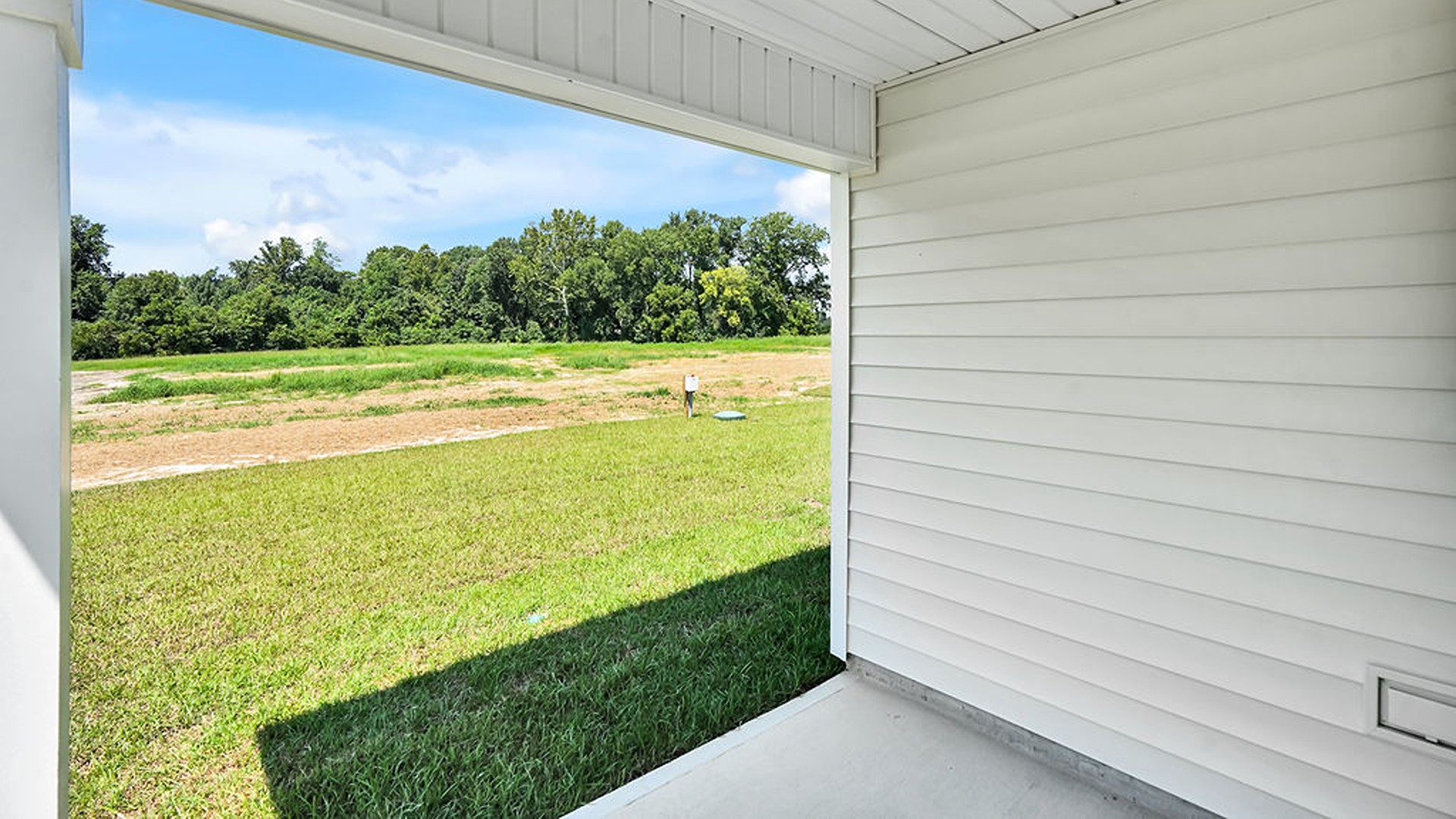 Enjoy the covered porch perfect for entertaining and enjoying the Carolina evenings.
