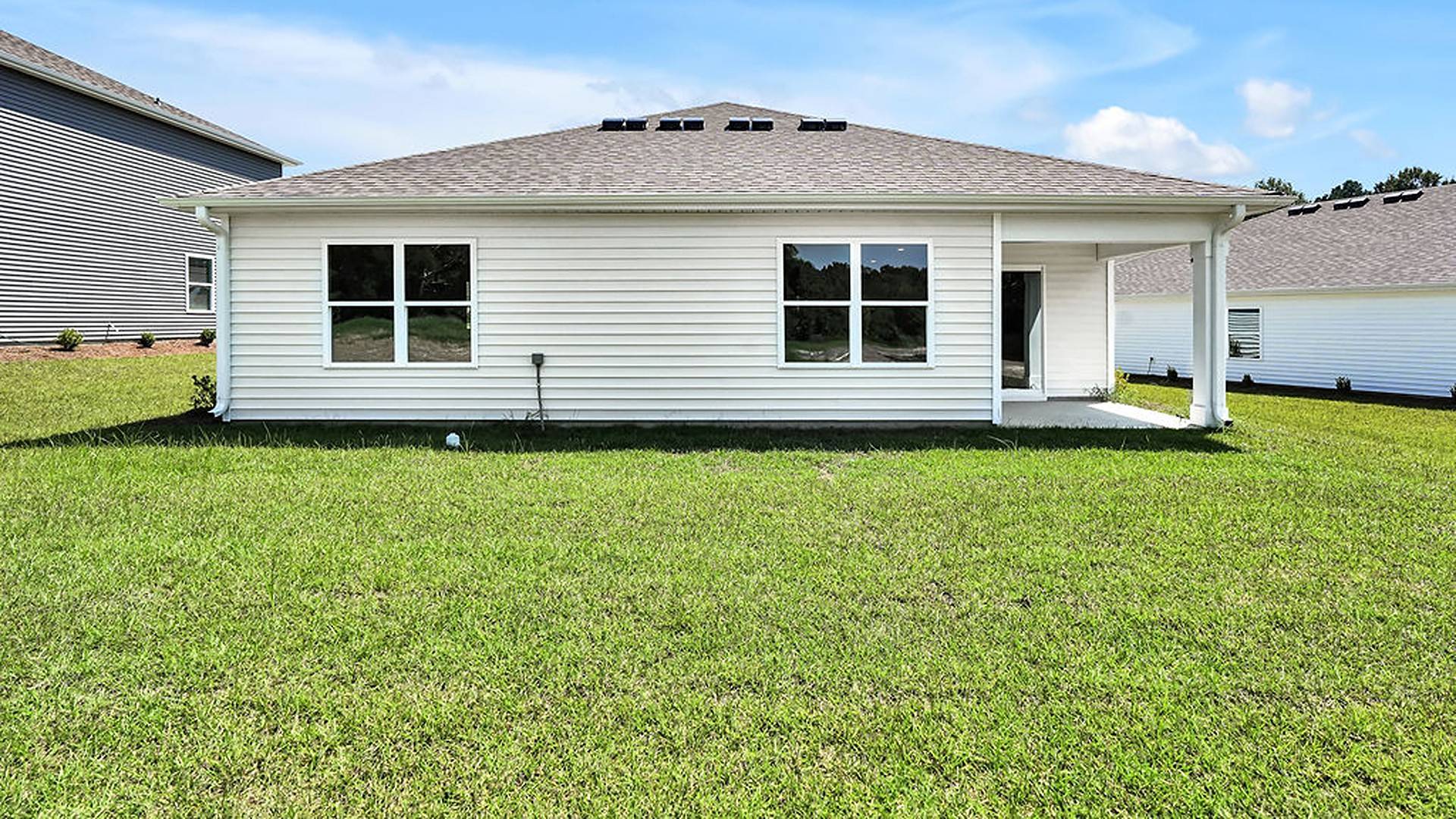 Enjoy the covered porch perfect for entertaining and enjoying the Carolina evenings.
