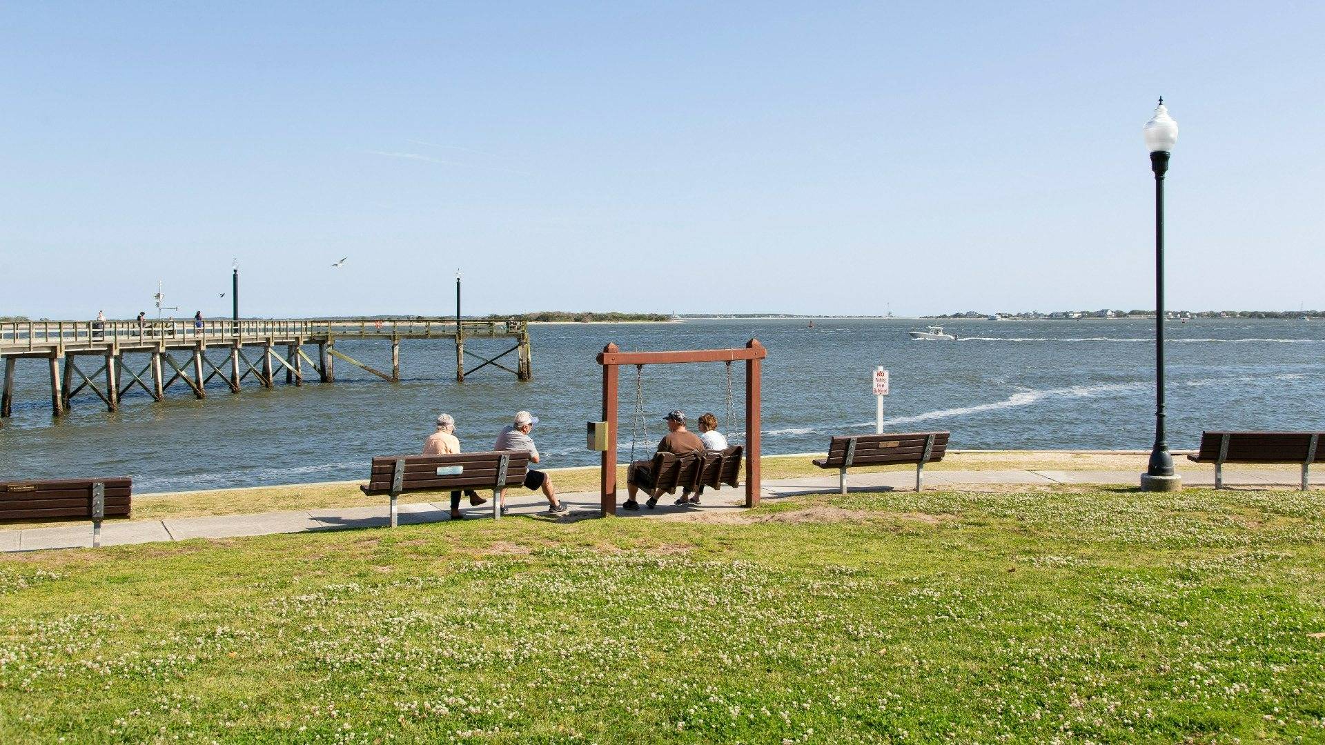 Renowned for its stunning beaches, the region is a haven for water sports enthusiasts. Boaters can reach Sunset Harbor Boat Ramp in just 15 minutes. Golfers have access to numerous world-class courses and resorts. Beach lovers are in for a treat with quick drives to the finest beaches in Brunswick County like Oak Island, Holden Beach, and Ocean Isle in North Carolina, as well as Cherry Grove and North Myrtle Beach in South Carolina. Nearby Southport boasts a variety of retail and dining options, both big brands and local favorites