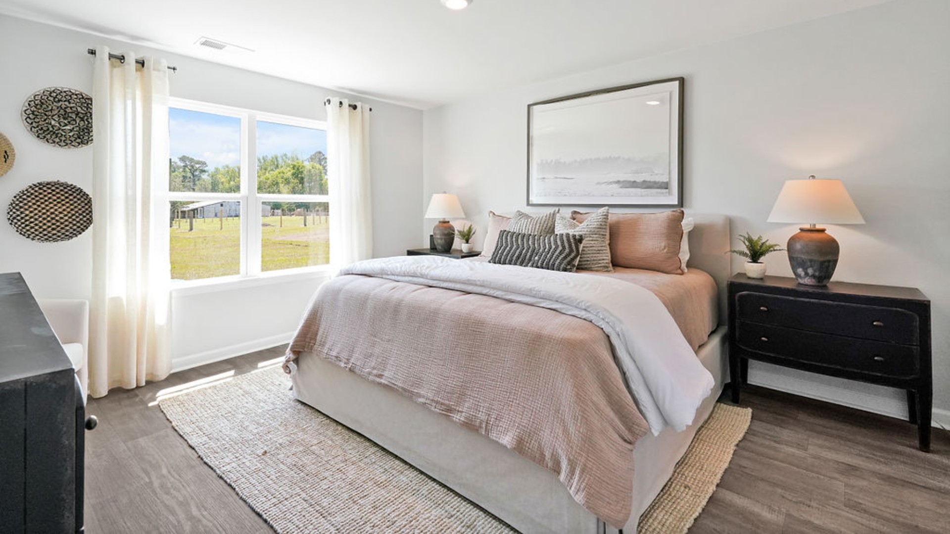 t the back, the Primary Suite provides privacy with a large walk-in closet and walk-in shower. In every bedroom you’ll have vinyl flooring and a closet in each room.