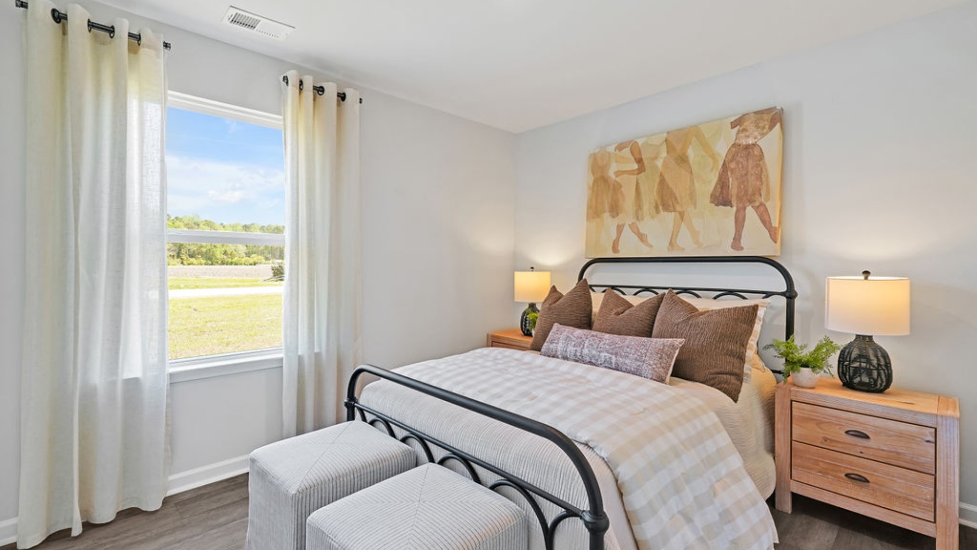 At the front are two guest bedrooms and a full bathroom, perfect for visitors or a home office