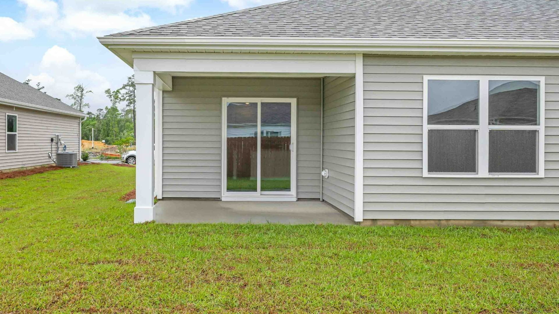 Enjoy the covered porch perfect for entertaining and enjoying the Carolina evenings.