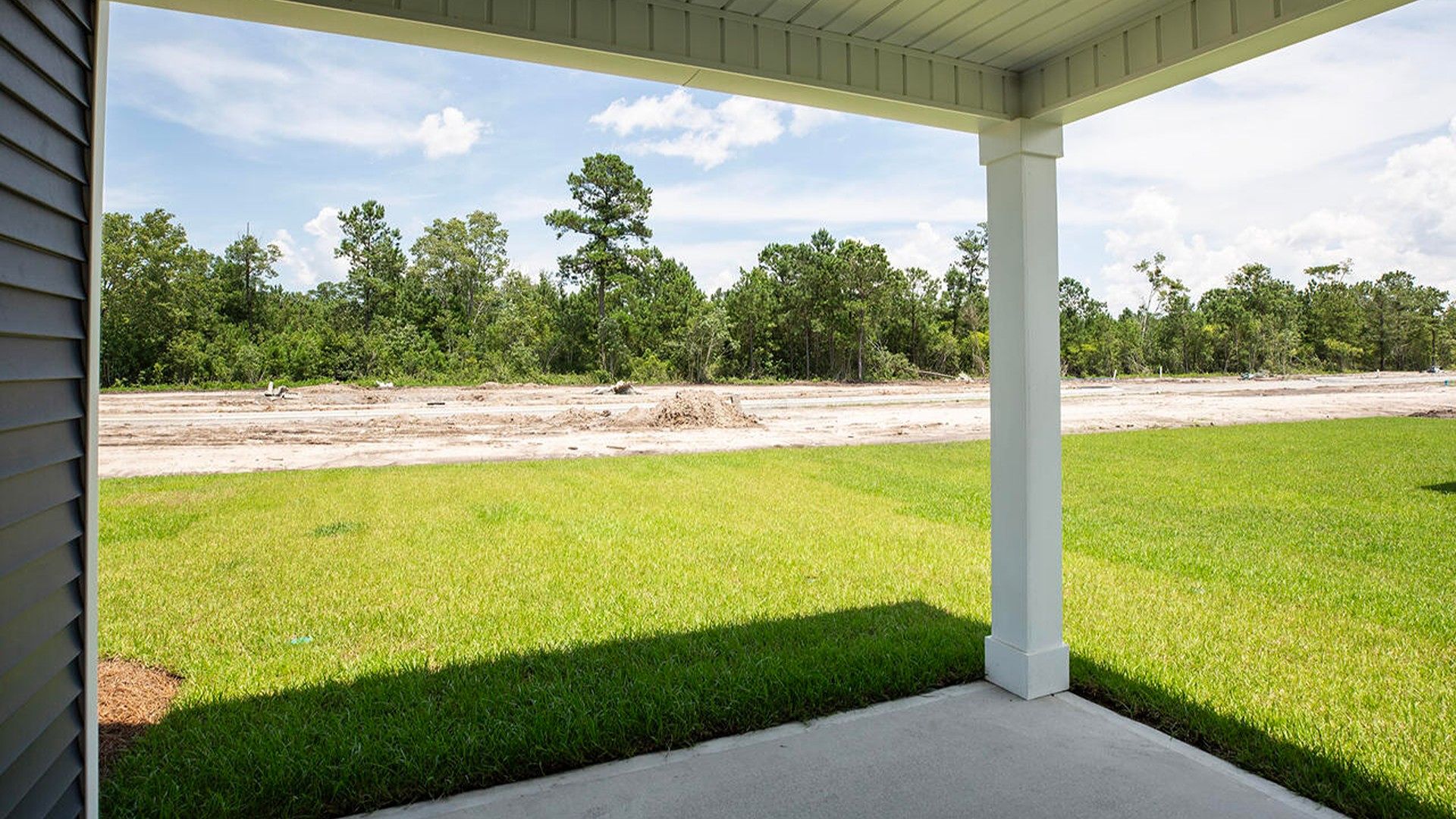 Enjoy the covered porch perfect for entertaining and enjoying the Carolina evenings.