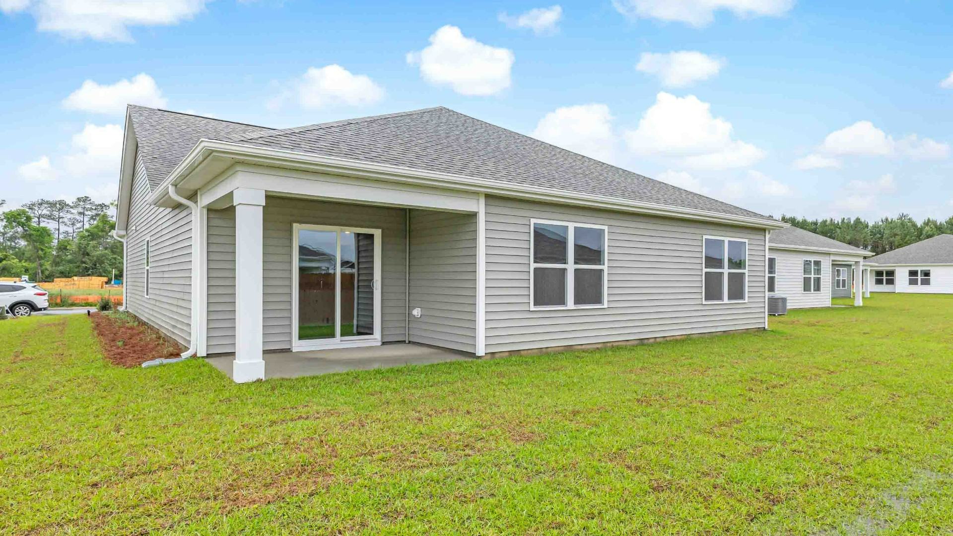 Enjoy the covered porch perfect for entertaining and enjoying the Carolina evenings