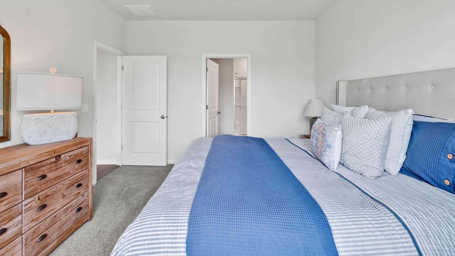 The primary bedroom has its own attached bathroom that features a walk-in closet and all the space you need to get ready in the morning.