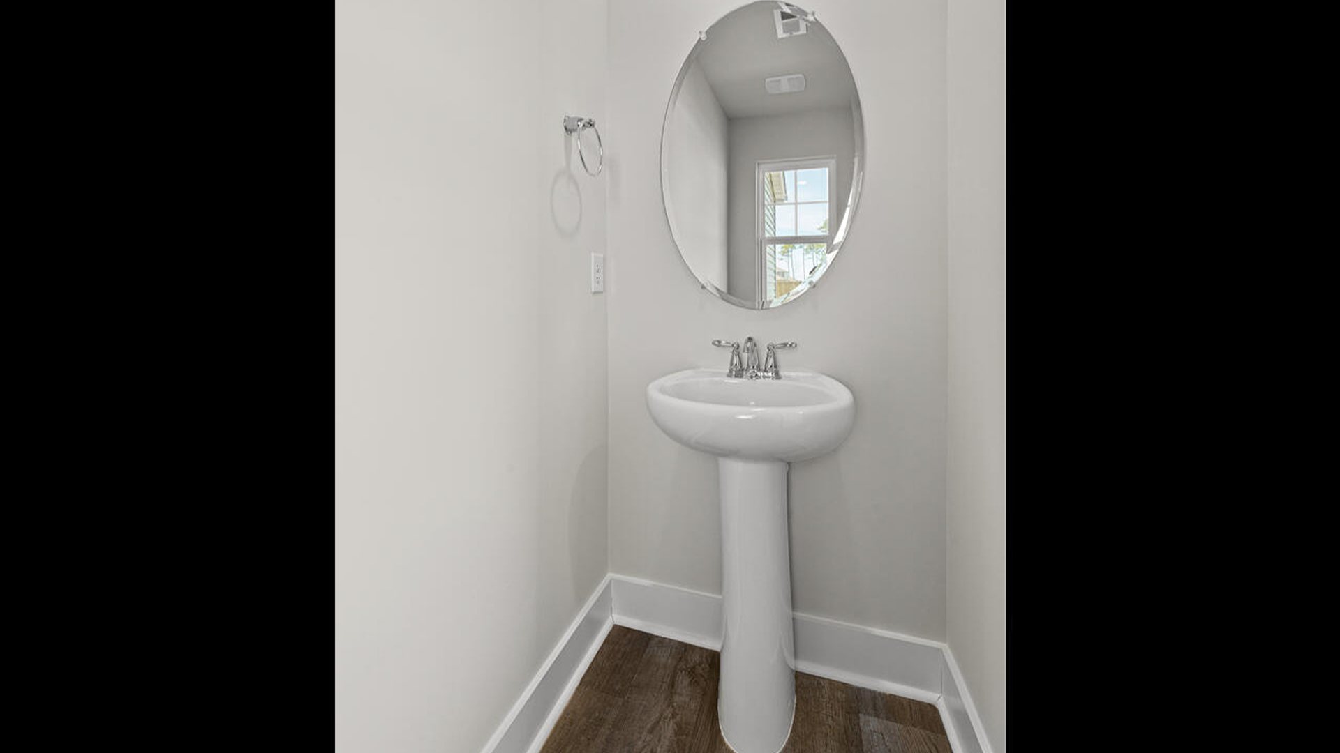 This is a 4-bedroom, 2.5-bathroom home with a 2-car garage, and it has the primary suite on the main level. Entering the great room we find the dining area, family room and a wonderful cook's kitchen are all together for open living.