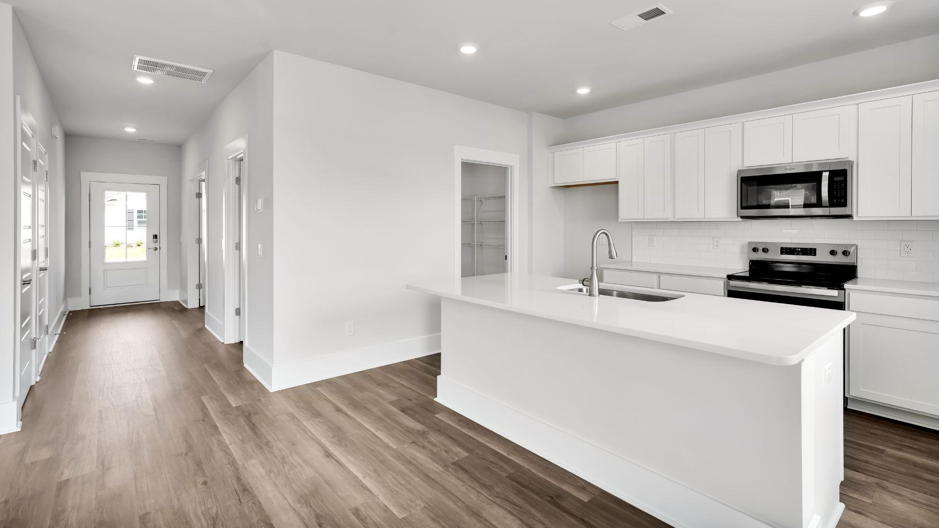 The living area is an open concept, where your kitchen, living, and dining areas blend seamlessly into a space perfect for everyday living and entertaining.