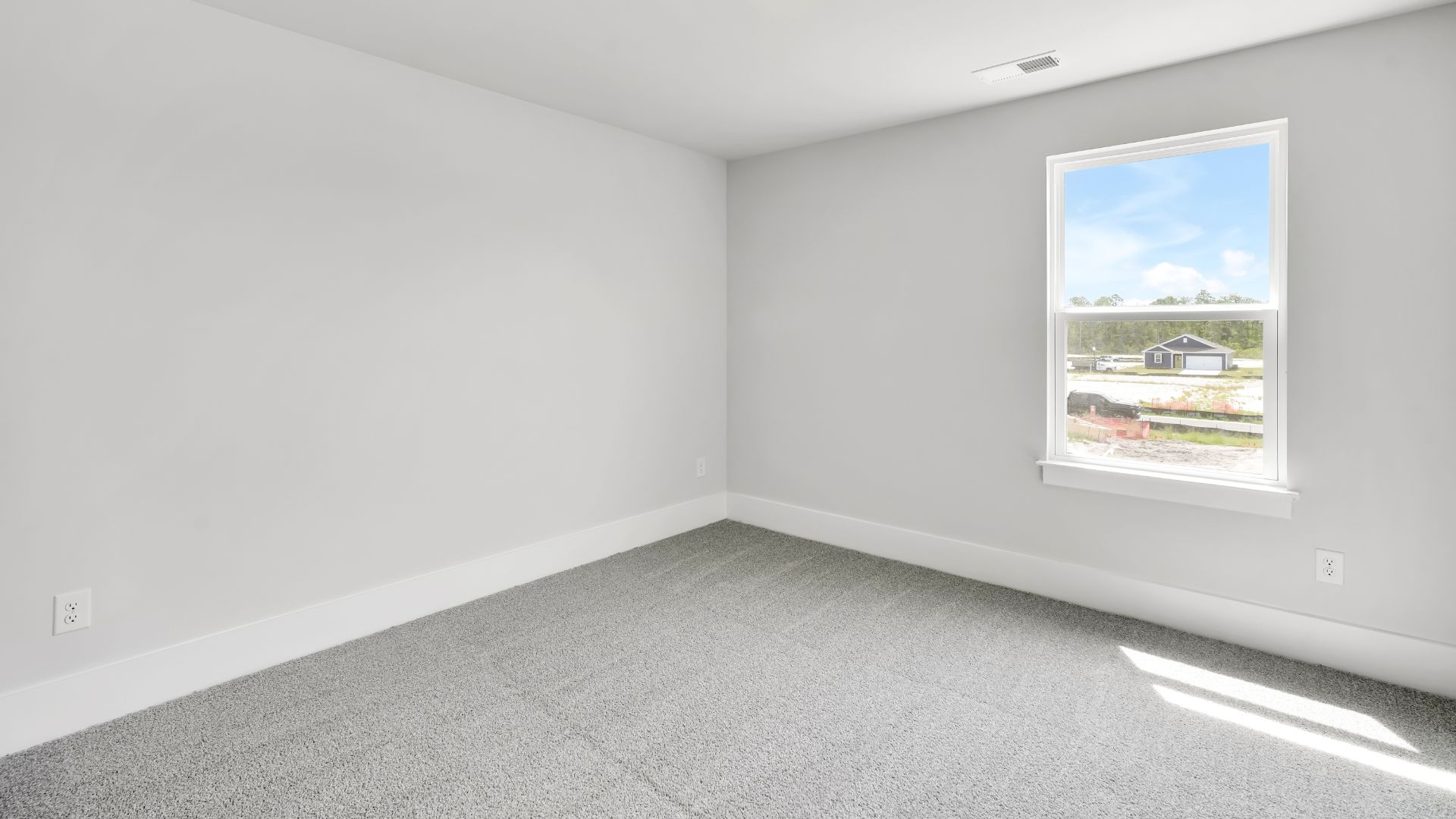 Upstairs, the Primary Suite offers a private bathroom, and the rest of the second floor includes three additional bedrooms and a convenient laundry room.