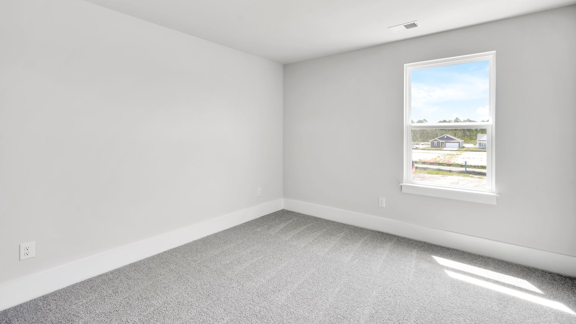 Upstairs, the Primary Suite offers a private bathroom, and the rest of the second floor includes three additional bedrooms and a convenient laundry room.
