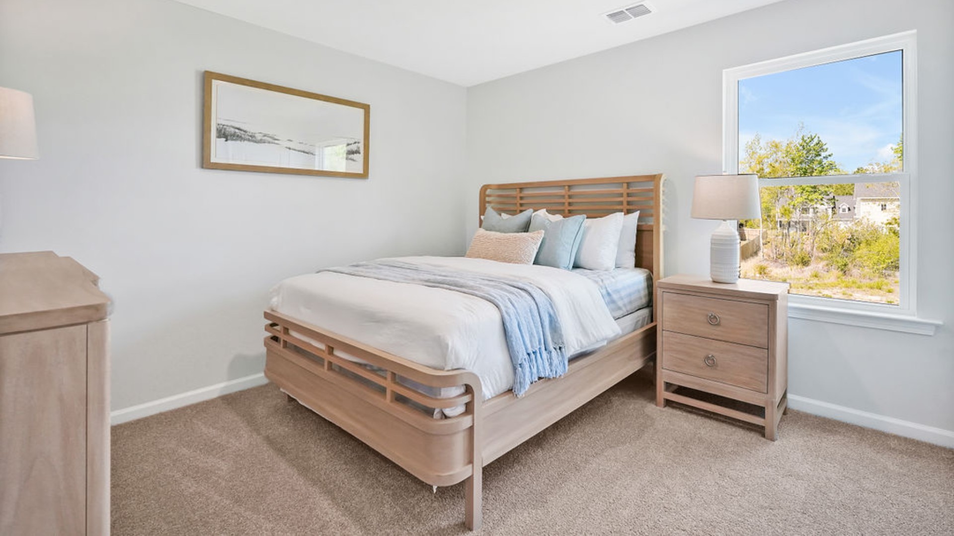 rest of the second floor includes three additional bedrooms and a convenient laundry room.