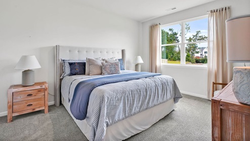 The primary bedroom has its own attached bathroom that features a walk-in closet and all the space you need to get ready in the morning. Sharing a sink isn’t a worry with the double vanity, and you also get additional privacy with a separate door for the toilet and shower.