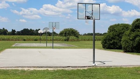 Recreation area featuring athletic fields and courts, trails, playgrounds, and a disc golf course.