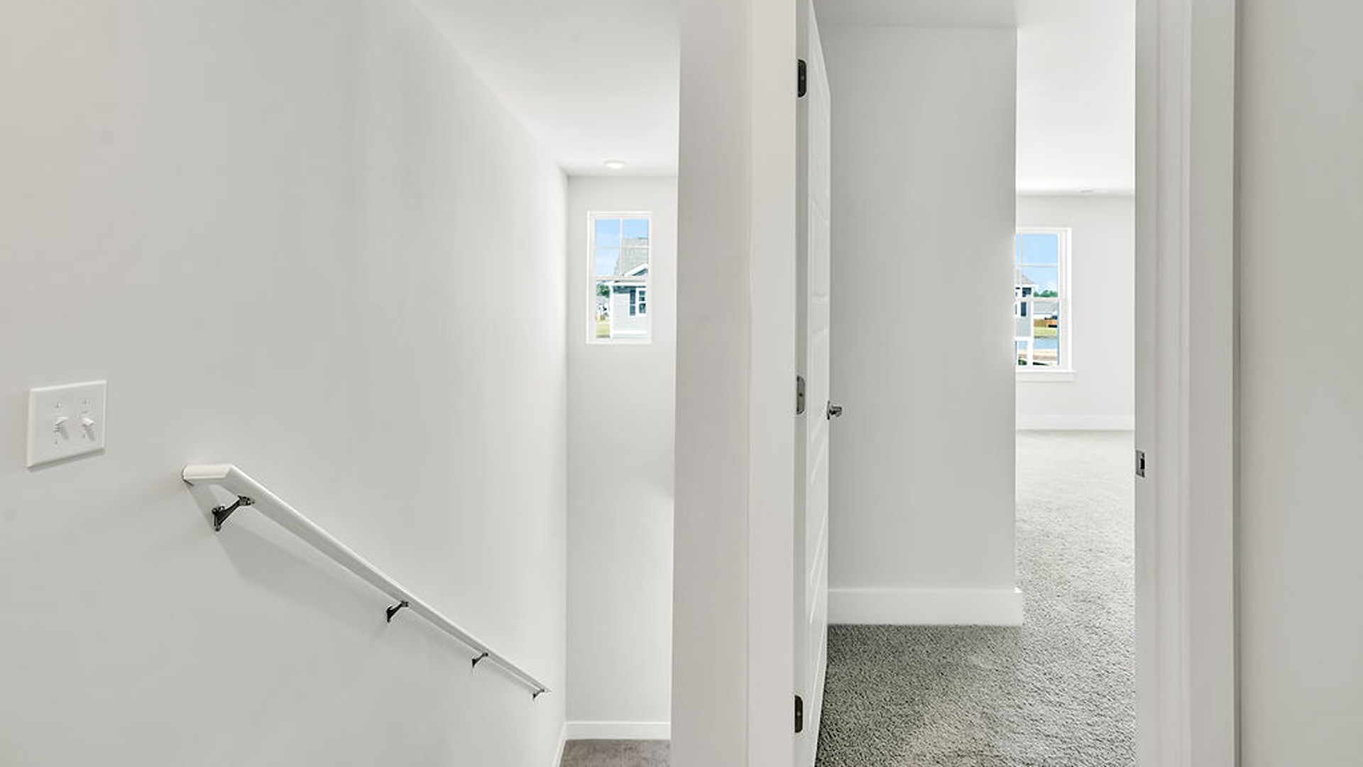The second floor features the primary bedroom with a walk-in closet and double vanities.