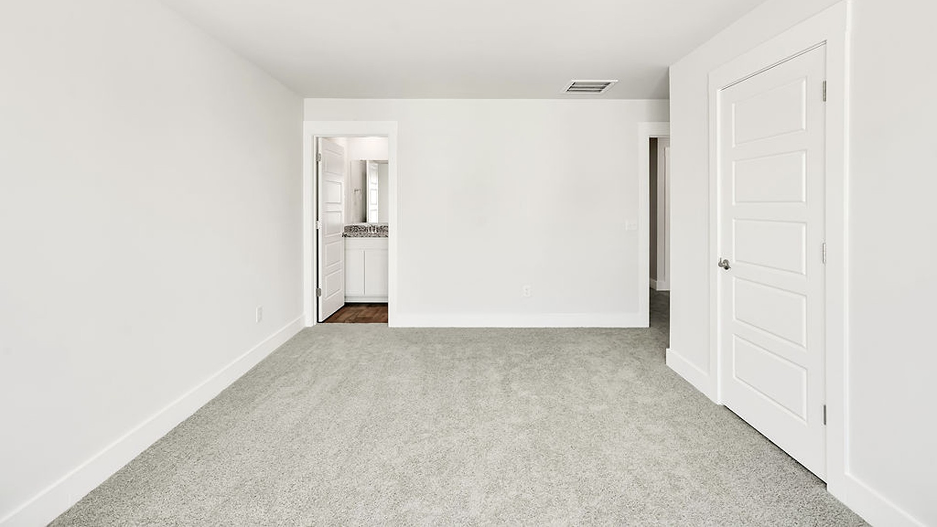 The second floor features the primary bedroom with a walk-in closet and double vanities.