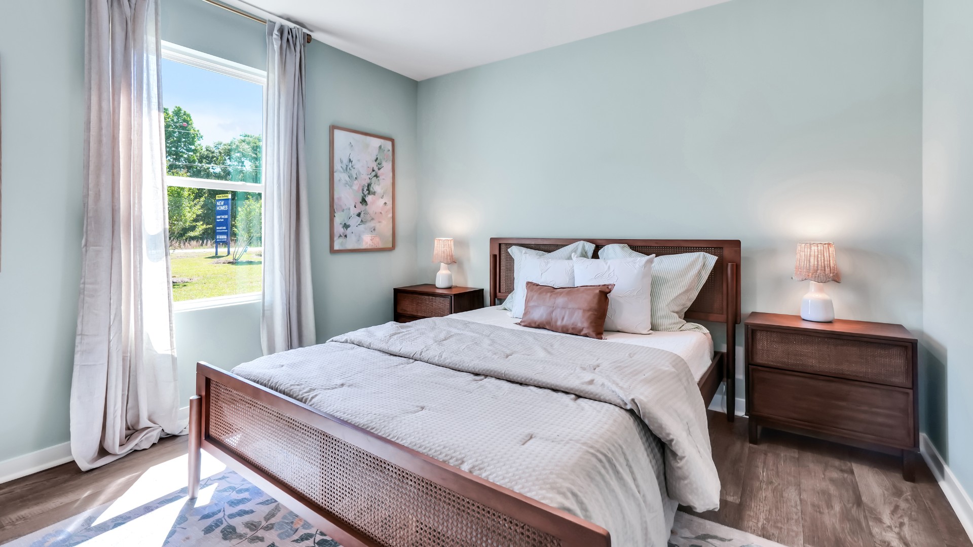 Three additional bedrooms are located up front- perfect for guests, kids, or a home office setup.