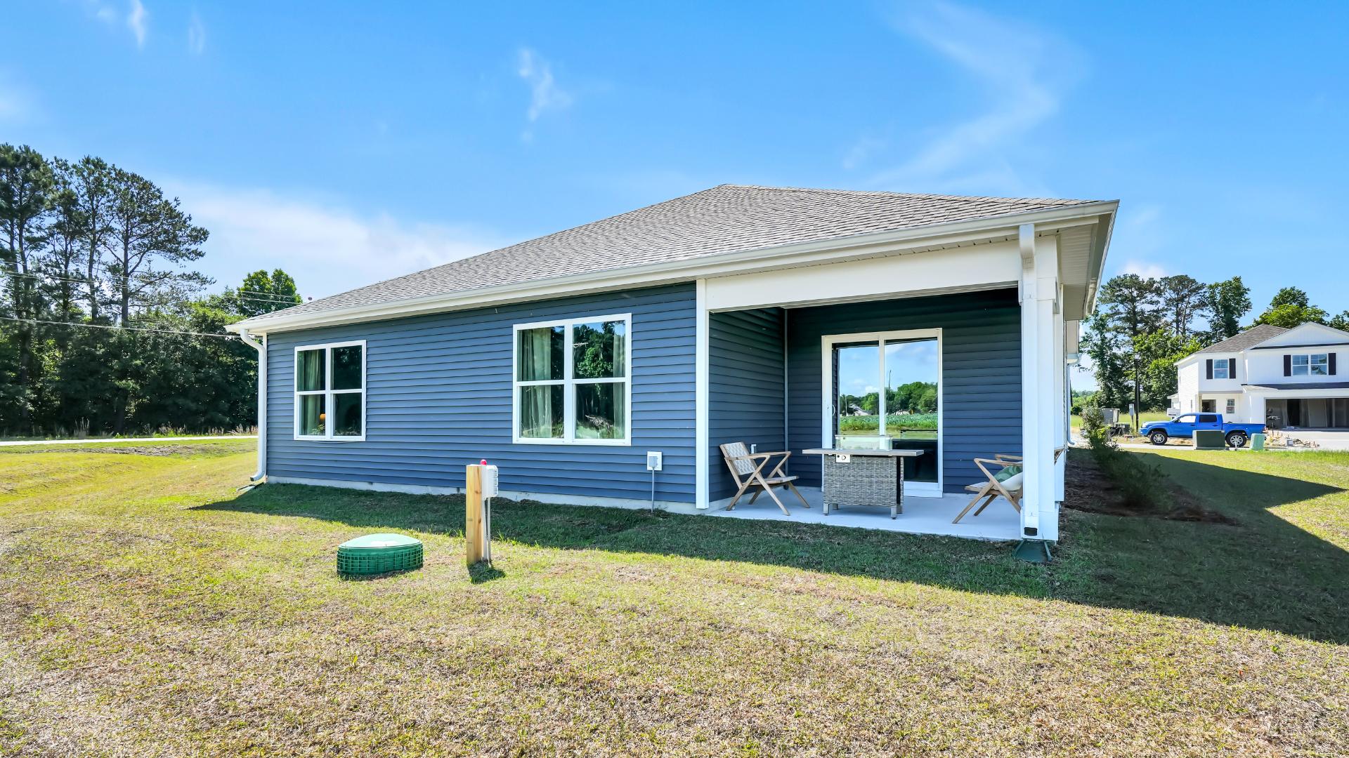 And don't forget the covered back porch, ready for morning coffee or sunset sips.