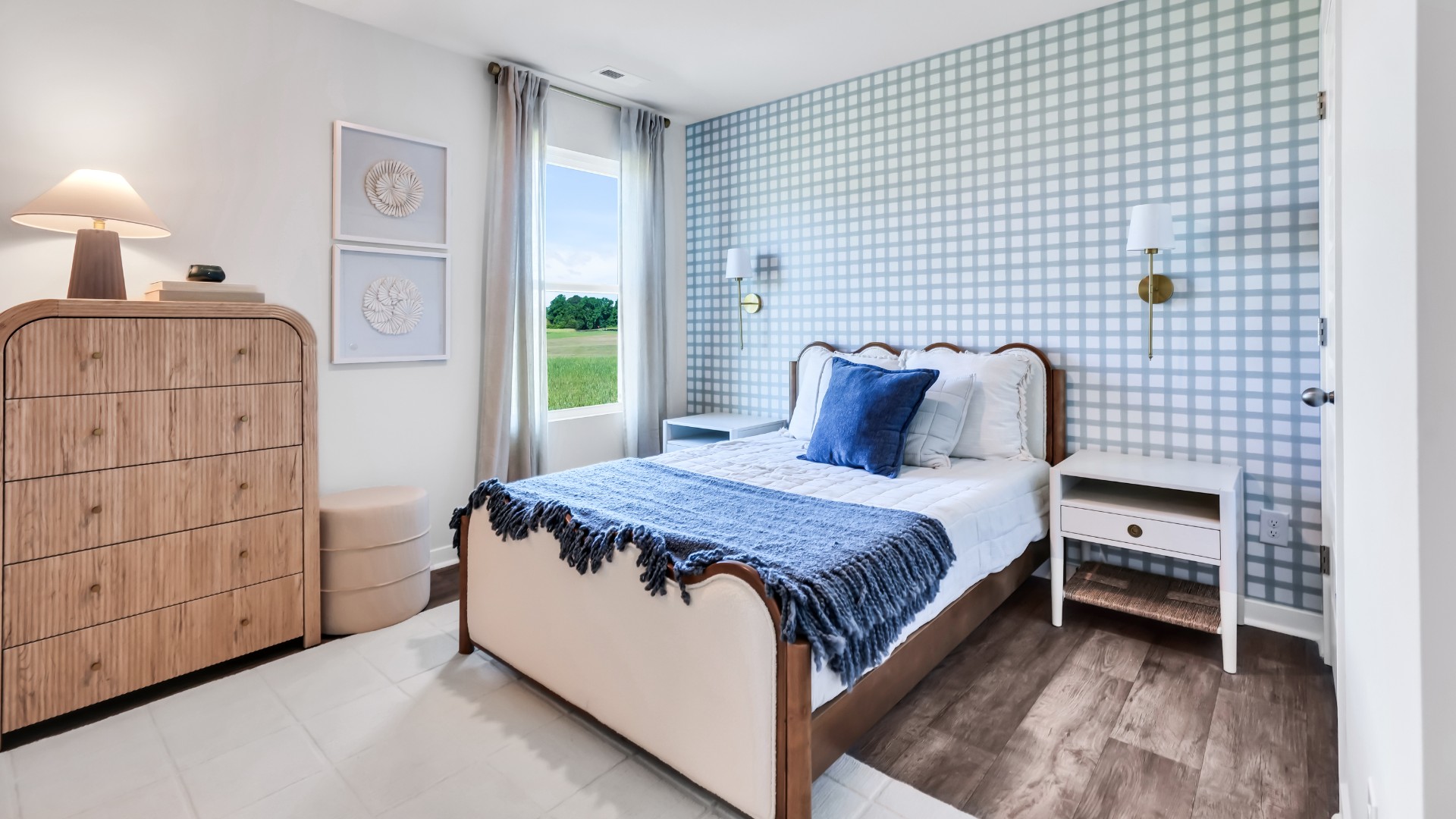 Three additional bedrooms are located up front- perfect for guests, kids, or a home office setup.