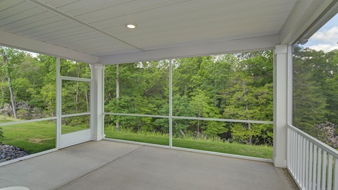 The back porch at this model home is screened-in.