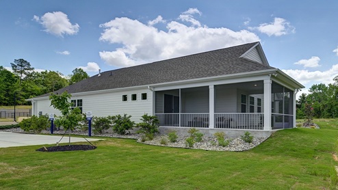 Back and side exterior of this home finished with durable Hardie Plank siding.