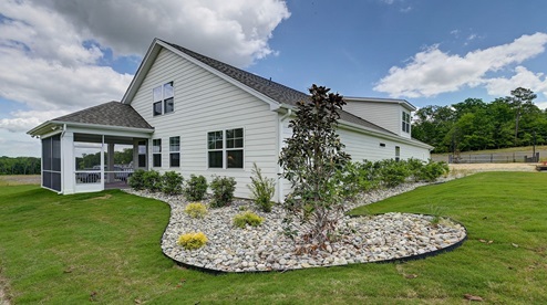 Back and side exterior of this home finished with durable Hardie Plank siding.