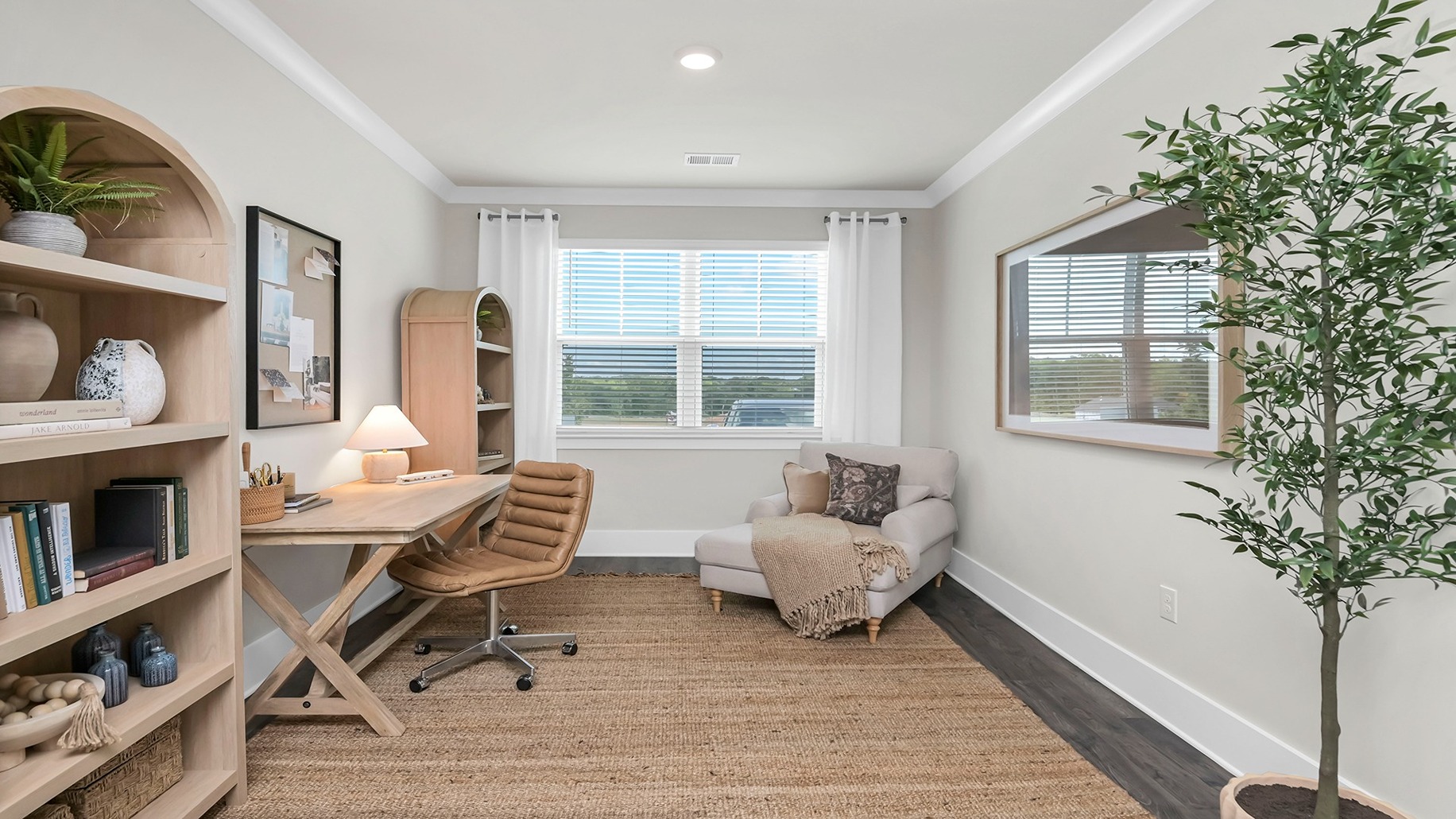 There is a flex space on the first floor that is staged as an office area.