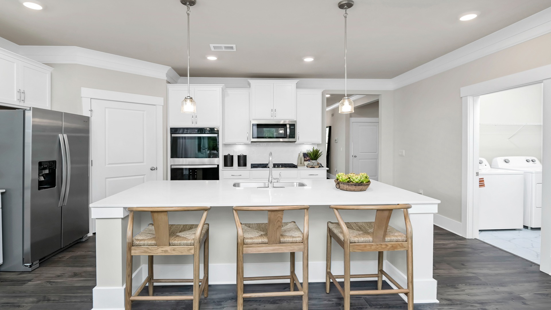 There is room for barstool seating at the floating kitchen island.