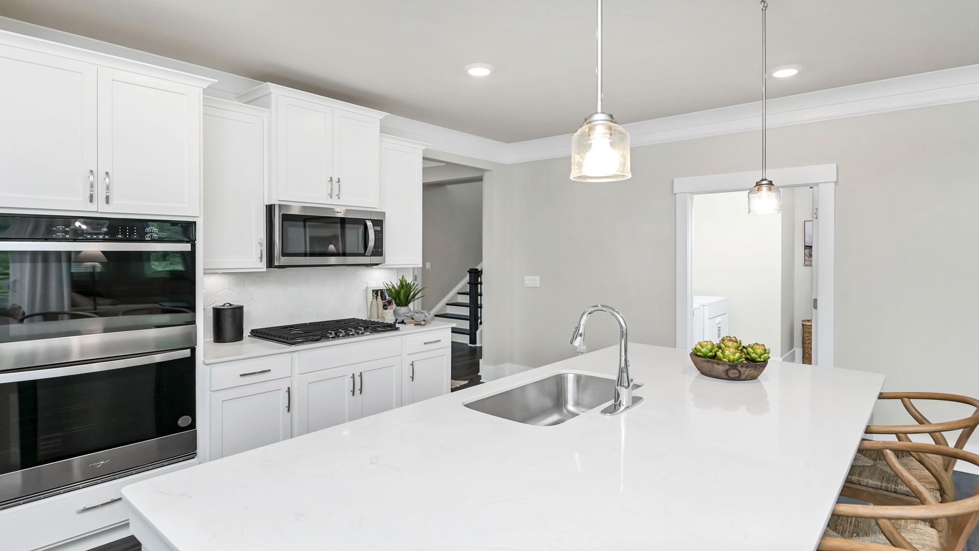 Tile backsplash also finishes the kitchen area