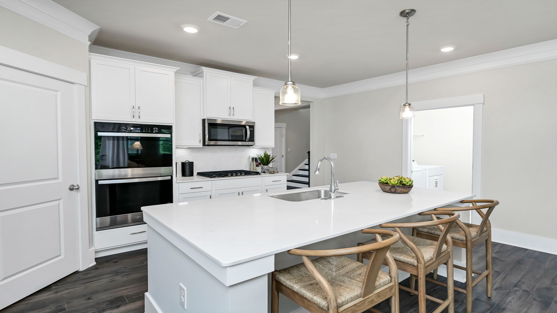Space for barstool seating at floating kitchen island